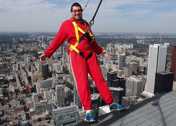 Gordon V walks outside the CN Tower, high above Toronto, after completing cancer treatments in 2012. (Handout)